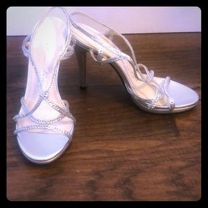 CLOSET CLOSING. MAKE OFFER. Silver heels size 5.5